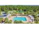 Enjoy this community pool with plenty of lounge chairs at 6843 Runner Oak Dr, Wesley Chapel, FL 33545
