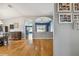 Open hallway separating dining and living areas at 6843 Runner Oak Dr, Wesley Chapel, FL 33545