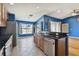 Kitchen with stainless steel appliances and granite countertops at 6843 Runner Oak Dr, Wesley Chapel, FL 33545