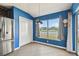 Bright kitchen nook with view of backyard and sliding glass doors at 6843 Runner Oak Dr, Wesley Chapel, FL 33545