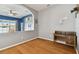 Home office with view into living area and wooden desk at 6843 Runner Oak Dr, Wesley Chapel, FL 33545