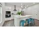 Modern kitchen with island, stainless steel appliances and breakfast bar at 6439 Taylor Ct, New Port Richey, FL 34653