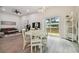 Casual dining area with view to backyard at 6439 Taylor Ct, New Port Richey, FL 34653