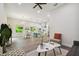 Open living area with adjacent kitchen at 6439 Taylor Ct, New Port Richey, FL 34653
