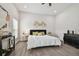 King-size bed and large windows in a well-designed bedroom at 6439 Taylor Ct, New Port Richey, FL 34653