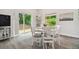 Cozy dining space near sliding glass doors at 6439 Taylor Ct, New Port Richey, FL 34653