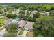 Aerial view of the house nestled amongst lush greenery at 6439 Taylor Ct, New Port Richey, FL 34653