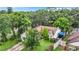 Single story house with a large backyard and basketball court at 5001 80Th Avenue E Cir, Sarasota, FL 34243