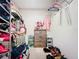 Closet with shelving and hanging space for clothes and shoes at 5001 80Th Avenue E Cir, Sarasota, FL 34243