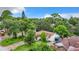 Single-story house with a driveway and basketball hoop at 5001 80Th Avenue E Cir, Sarasota, FL 34243