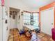Kitchen area with white cabinets and tile floor at 5001 80Th Avenue E Cir, Sarasota, FL 34243