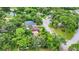 Community overview featuring tree-lined streets and houses at 5001 80Th Avenue E Cir, Sarasota, FL 34243
