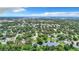 Wide view of the neighborhood with a lake at 5001 80Th Avenue E Cir, Sarasota, FL 34243
