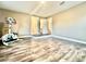 Bedroom showcasing hardwood floors and white trim at 1109 Belcher Rd, Palm Harbor, FL 34683
