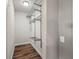 Functional closet with built-in metal shelving for optimal storage, great for organization at 1109 Belcher Rd, Palm Harbor, FL 34683