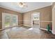 Dining room with view to the backyard and kitchen at 1109 Belcher Rd, Palm Harbor, FL 34683