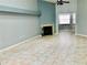 Living room with fireplace and tiled floors at 10425 La Mirage Ct # 202, Tampa, FL 33615