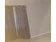 Bedroom with dark curtains and neutral walls at 10425 La Mirage Ct # 202, Tampa, FL 33615