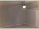 Bright bedroom featuring a ceiling fan and neutral walls at 10425 La Mirage Ct # 202, Tampa, FL 33615