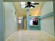 Dining room with kitchen pass-through and skylight at 10425 La Mirage Ct # 202, Tampa, FL 33615