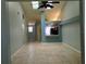 Dining room with kitchen pass-through and skylight at 10425 La Mirage Ct # 202, Tampa, FL 33615