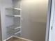 Functional pantry with wire shelving for storage at 10425 La Mirage Ct # 202, Tampa, FL 33615