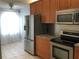 Kitchen with stainless steel appliances and granite countertops at 10425 La Mirage Ct # 202, Tampa, FL 33615