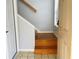 View of stairs leading to the upper level of the home at 10425 La Mirage Ct # 202, Tampa, FL 33615