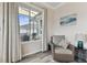 Cozy sitting area with window seat and outdoor view at 1119 Villeroy Dr, Sun City Center, FL 33573