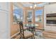 Kitchen nook with glass table and chairs, offering natural light at 1119 Villeroy Dr, Sun City Center, FL 33573