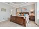 Bright and airy main bedroom, featuring a large bed and calming decor at 1119 Villeroy Dr, Sun City Center, FL 33573