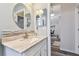 Bathroom with a vanity and view to another room at 1119 Villeroy Dr, Sun City Center, FL 33573