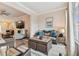 Open living room with a view into another living area at 1119 Villeroy Dr, Sun City Center, FL 33573