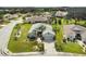 Single-Gathering home with landscaping and driveway at 1119 Villeroy Dr, Sun City Center, FL 33573