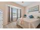 Bedroom with bay window and neutral color palette at 1119 Villeroy Dr, Sun City Center, FL 33573
