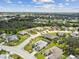 Aerial view of a luxury community with single Gathering homes and lush landscaping at 1119 Villeroy Dr, Sun City Center, FL 33573