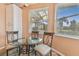 Kitchen nook with glass table and chairs, offering natural light at 1119 Villeroy Dr, Sun City Center, FL 33573