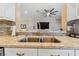 Clean kitchen sink with a modern faucet and granite countertop at 1119 Villeroy Dr, Sun City Center, FL 33573