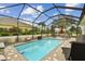 Inviting screened pool and patio perfect for outdoor relaxation at 1119 Villeroy Dr, Sun City Center, FL 33573