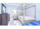 Bedroom with two beds and plenty of storage at 2406 High Tides Way, Wesley Chapel, FL 33543