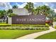 River Landing community entrance with landscaping at 2406 High Tides Way, Wesley Chapel, FL 33543