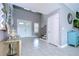 Elegant entryway with double doors and tiled floors at 2406 High Tides Way, Wesley Chapel, FL 33543