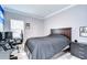 Bright bedroom with a double bed, desk, and plenty of closet space at 2406 High Tides Way, Wesley Chapel, FL 33543