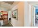 Bright hallway with view into kitchen and another room at 301 N Glen Ave, Tampa, FL 33609