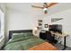 Bright bedroom with a double bed, workspace, and ample closet space at 301 N Glen Ave, Tampa, FL 33609