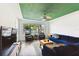 Spacious living area with comfy seating and a view to the front yard at 301 N Glen Ave, Tampa, FL 33609