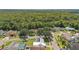 Aerial view showing a house in a residential neighborhood, highlighting the surrounding area at 8703 Charming Knoll Ct, Tampa, FL 33635