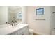 Clean bathroom with subway tile and vanity at 2613 Star Apple Way, Sarasota, FL 34240