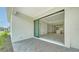 View of backyard patio with access to the kitchen and living area at 2613 Star Apple Way, Sarasota, FL 34240