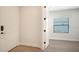 Bright and airy entryway with tile flooring and access to an additional room at 2613 Star Apple Way, Sarasota, FL 34240